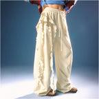 CHUU elastic waisted casual pants for women 2026 early spring new product letter printed asymmetrical ruffle edge splicing curved knife pants image 3