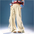 CHUU elastic waisted casual pants for women 2026 early spring new product letter printed asymmetrical ruffle edge splicing curved knife pants image 4