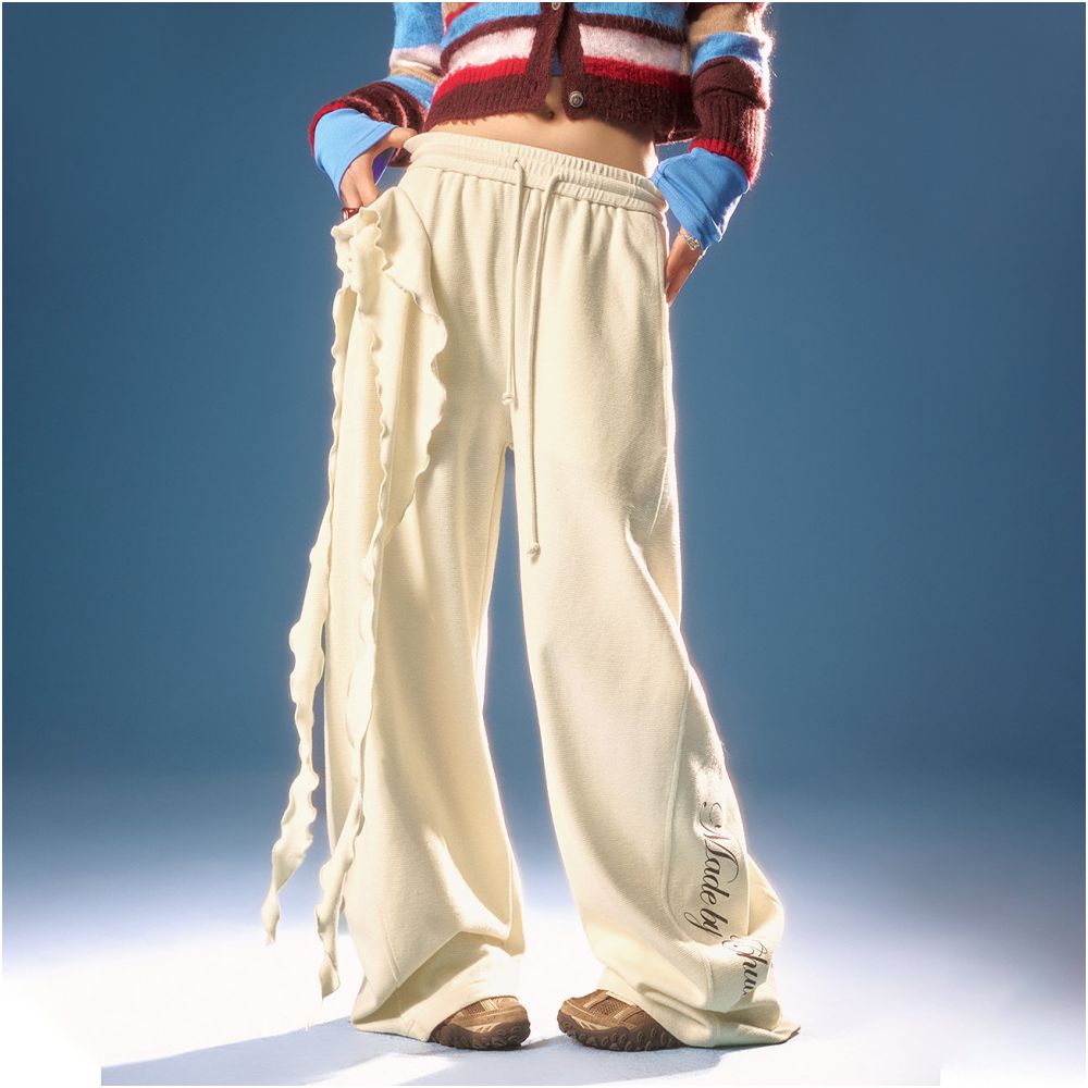 CHUU elastic waisted casual pants for women 2026 early spring new product letter printed asymmetrical ruffle edge splicing curved knife pants image 4