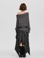 Woman wearing a gray off-shoulder top and plaid skirt on a white background, with 'GIRLYHALO' branding.